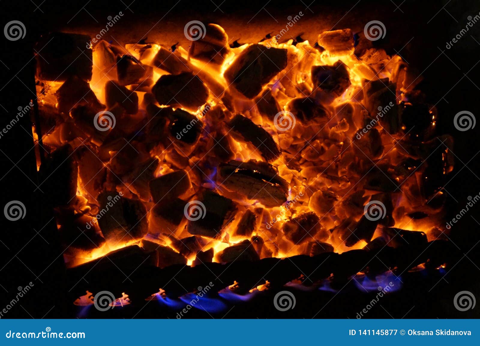 Hot Wood Coals Burn with Bright Flame in Iron Brazier Stock Image