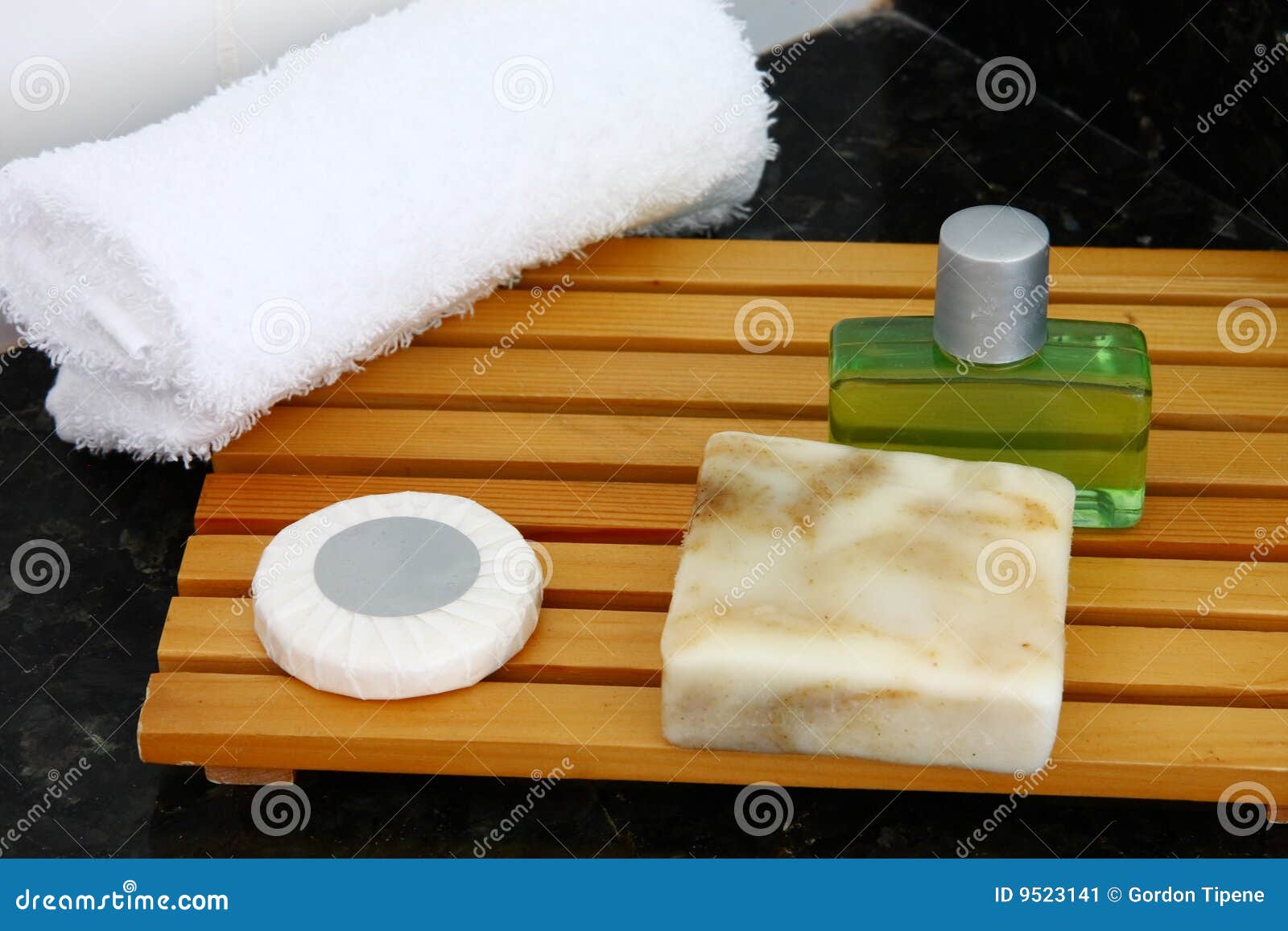 Hotel bathroom accessories stock image. Image of timber 9523141