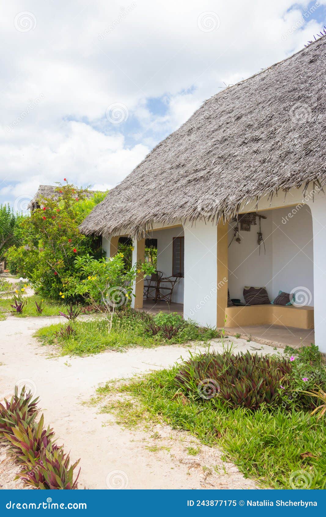 hotel cottage in tropical resort. rural cabin in tropics. tourist bungalow in exotic garden. summer vacations in africa.