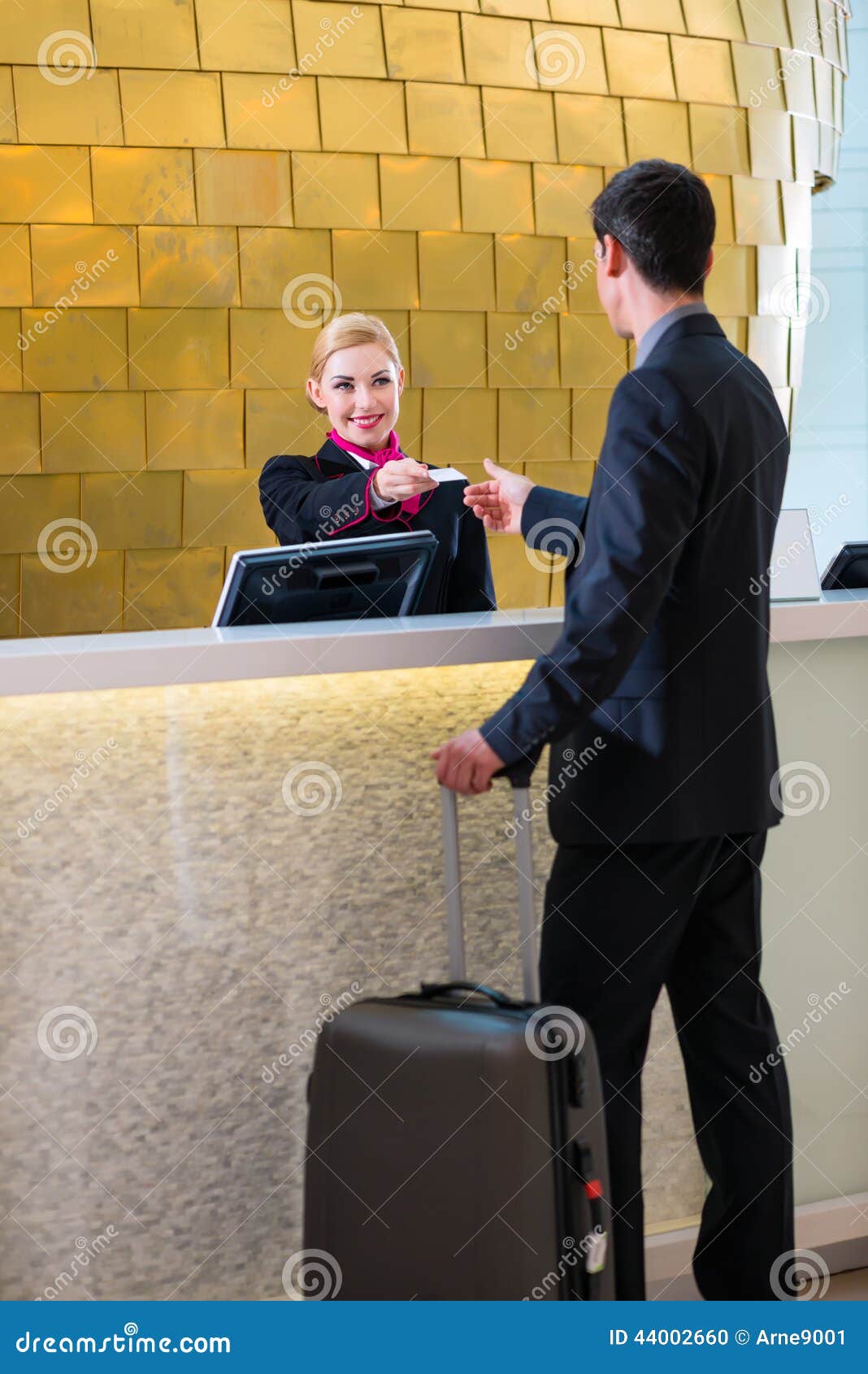Hotel Receptionist Check In Man Giving Key Card Stock