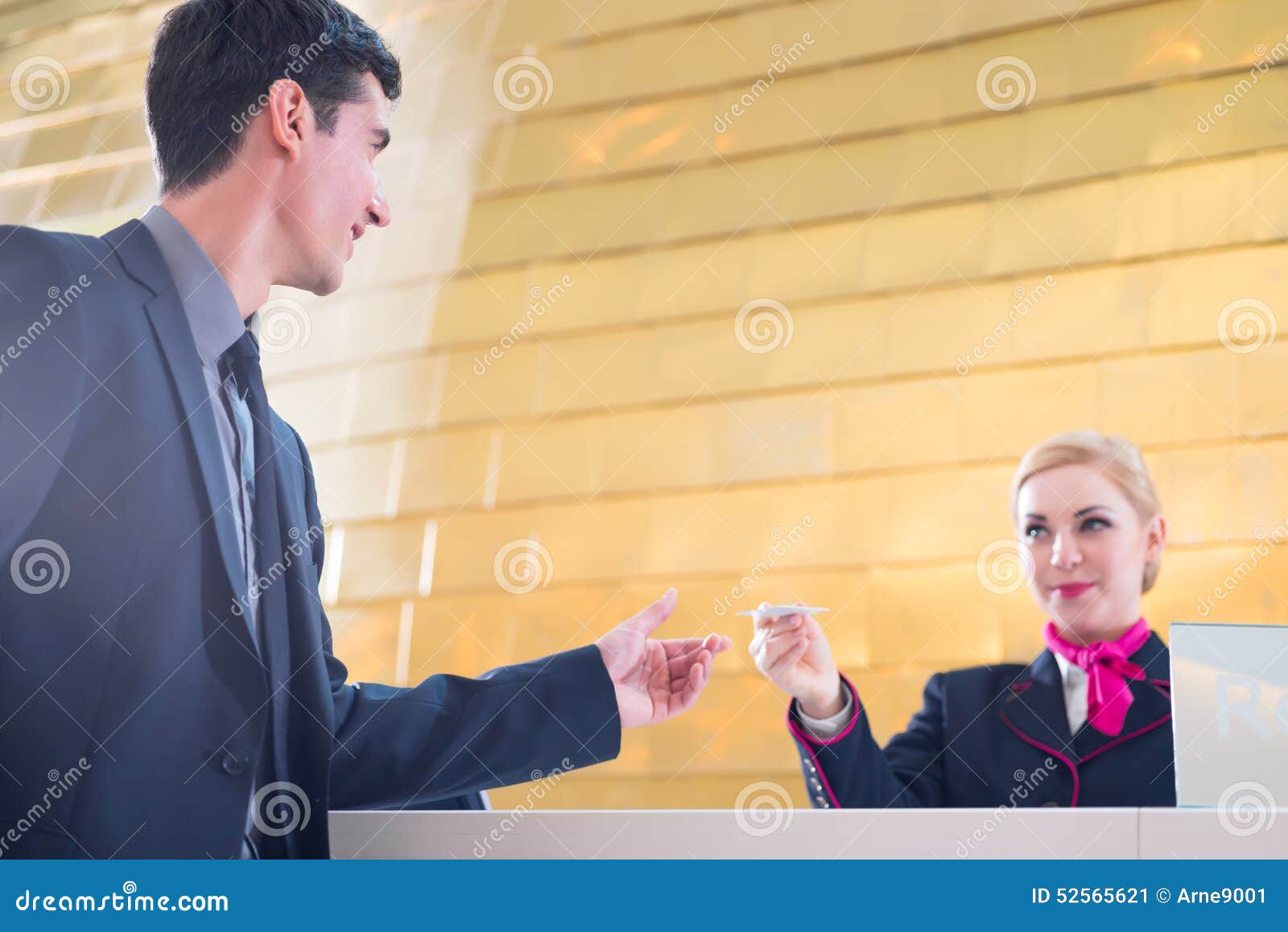 Hotel Receptionist Check In Man Giving Key Card Stock