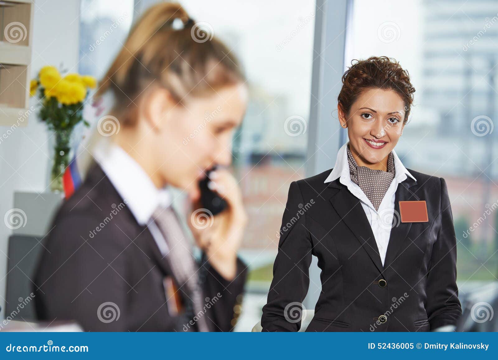 Hotel workers on reception stock image. Image of counter 52436005