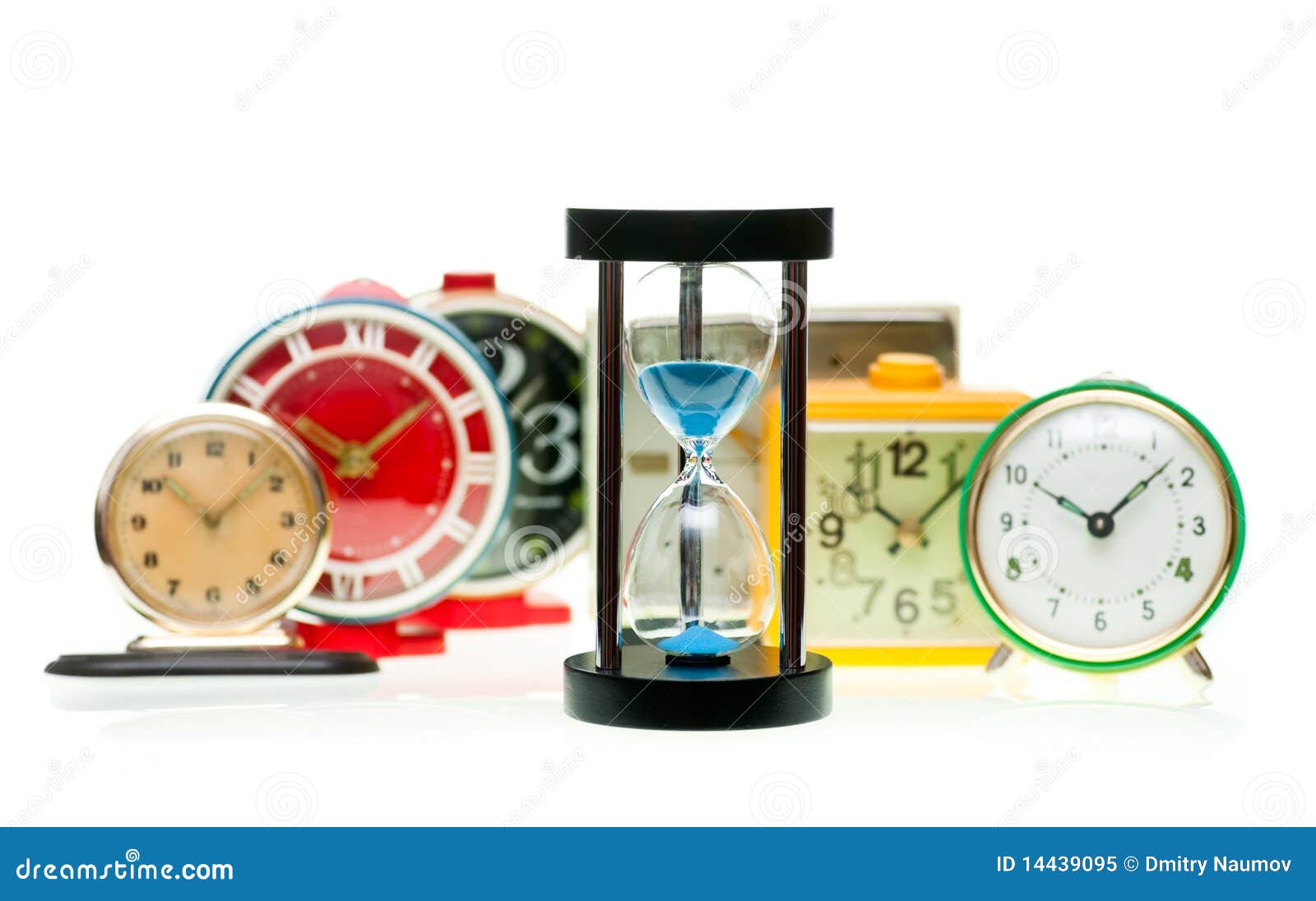 Hourglass and alarm clocks stock image. Image of passing 14439095