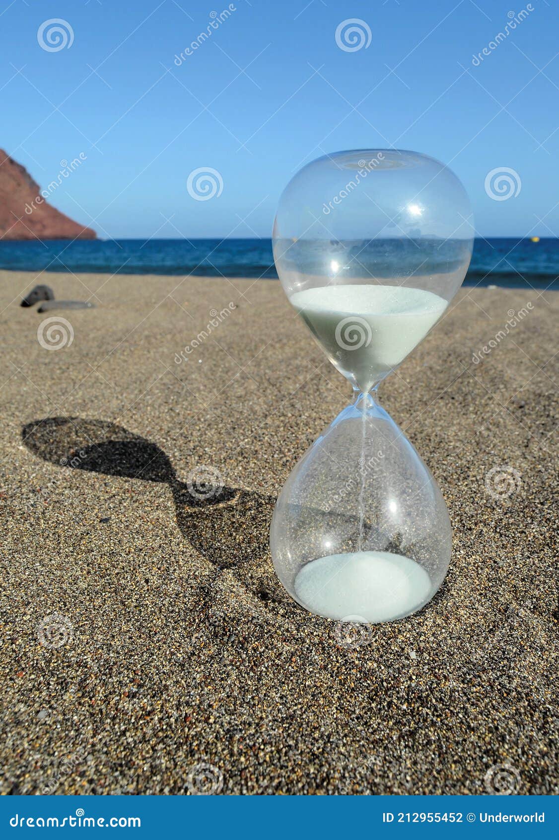 Hourglass on a Beach stock photo. Image of beach, hourglass - 212955452