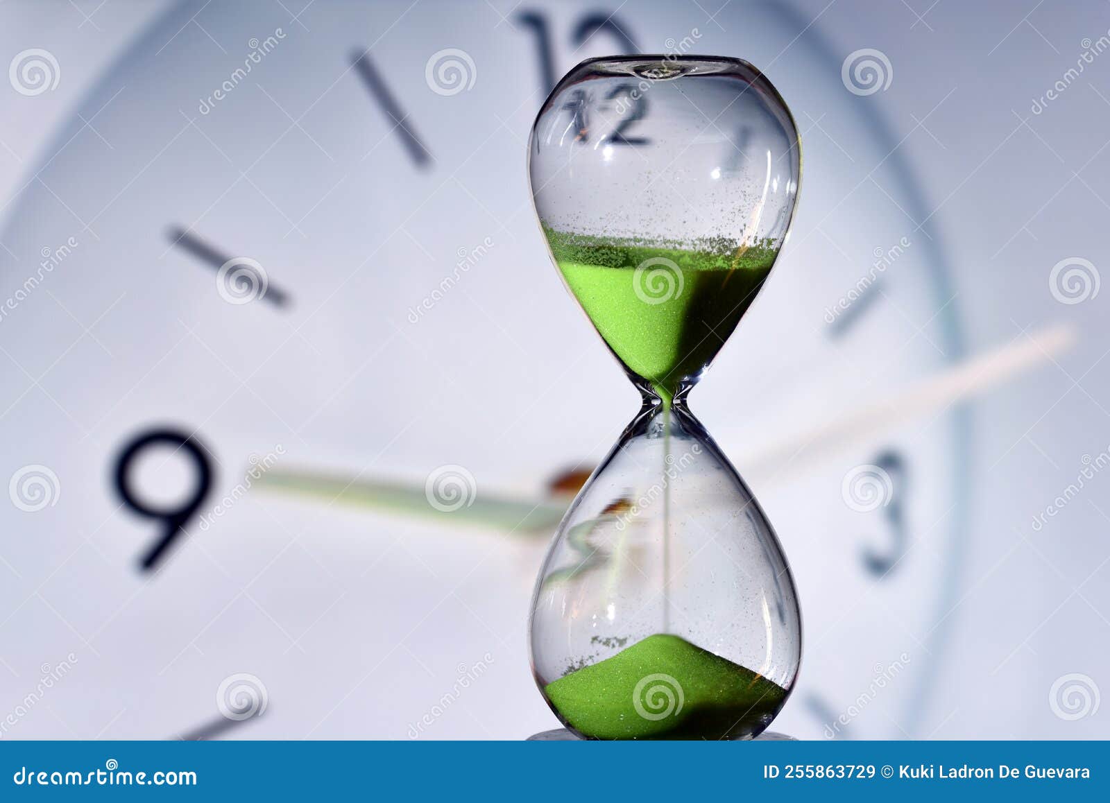 hourglass and round clock measuring time