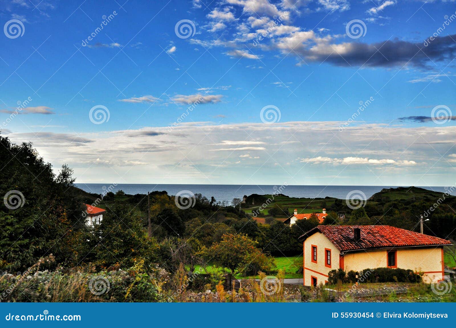 House on the beach. stock photo. Image of clouds, building 55930454