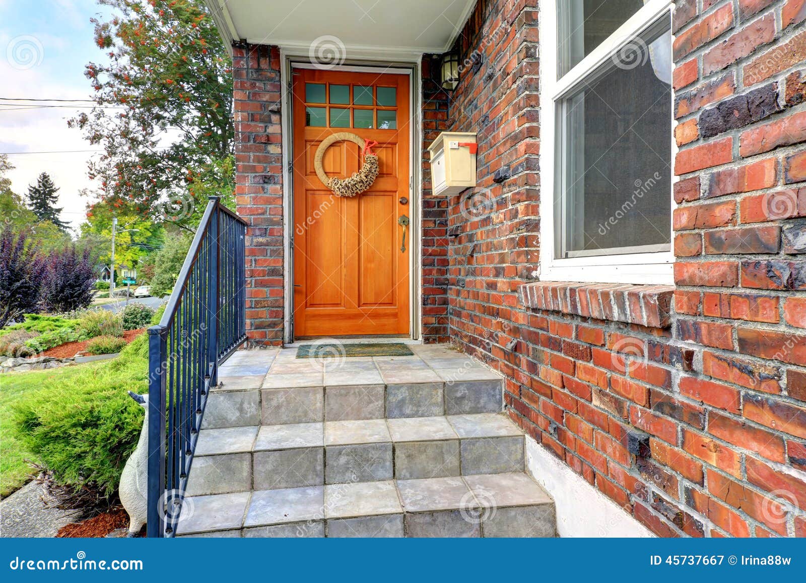 House With Brick Trim Entrance Porch With Orange Door House With Brick Trim Entrance Porch With Orange Door