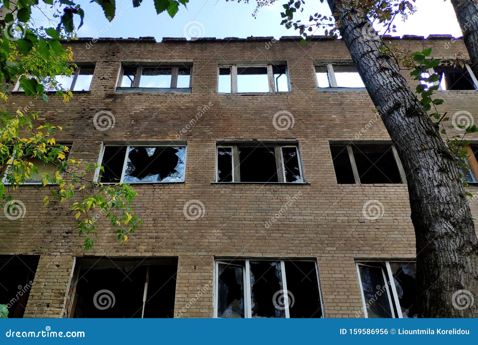 House with Broken Windows and Damaged Walls. Concept- War, Devastation