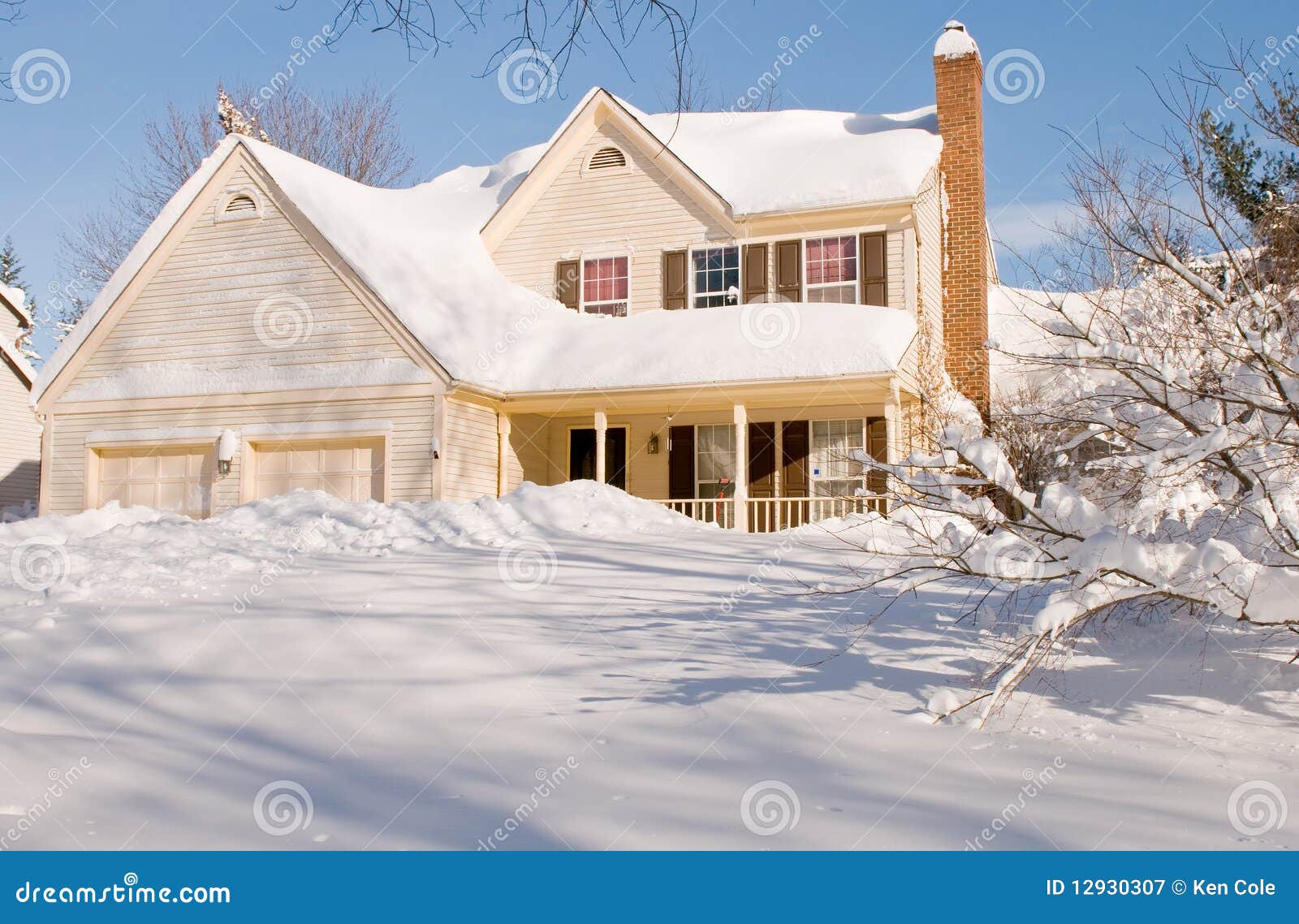 house covered in winter snow