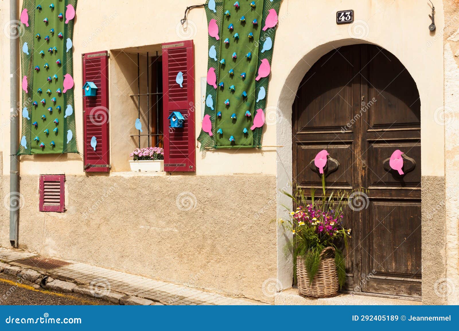 house, decorated with pink and blue birds on 