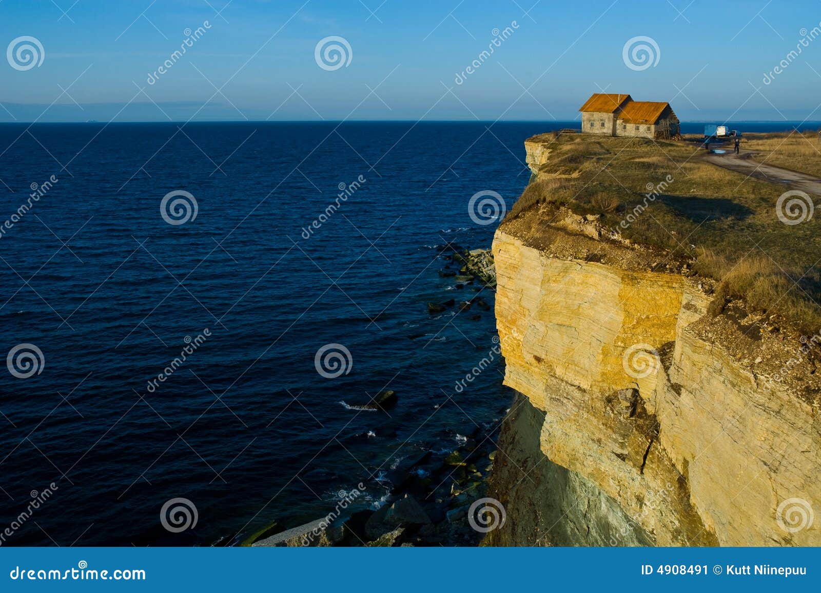 house on the edge of a cliff