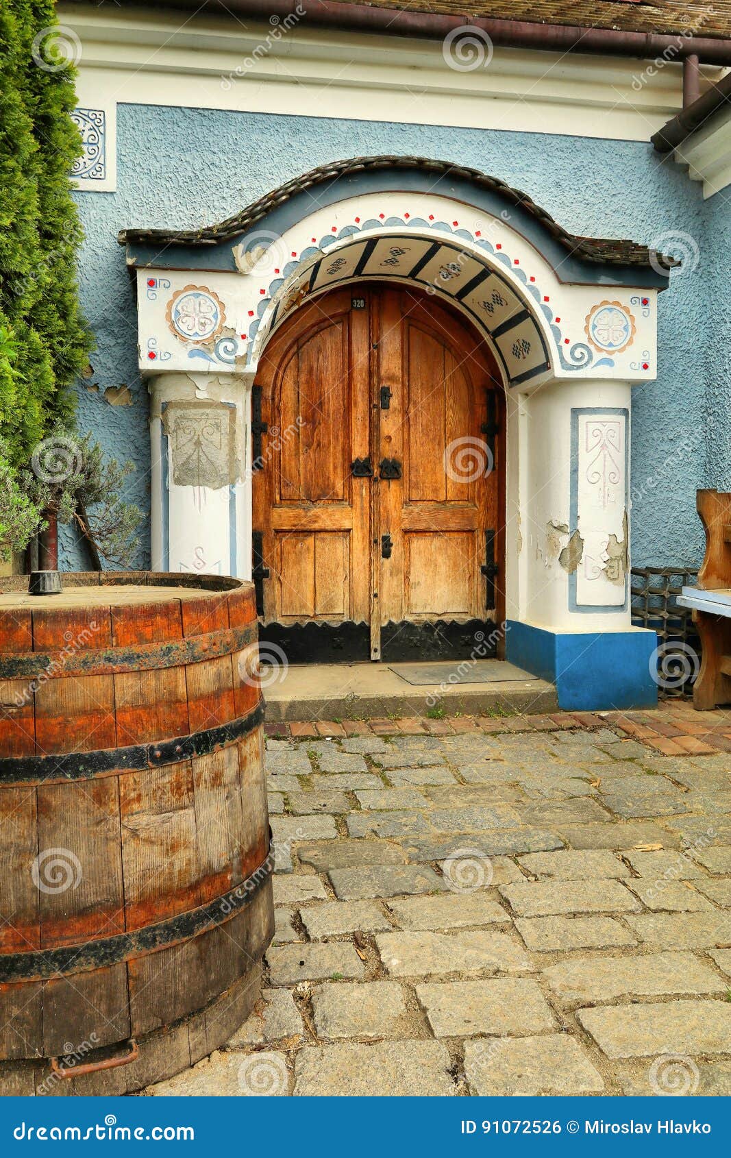 House entry and wine keg stock photo. Image of barrel 91072526