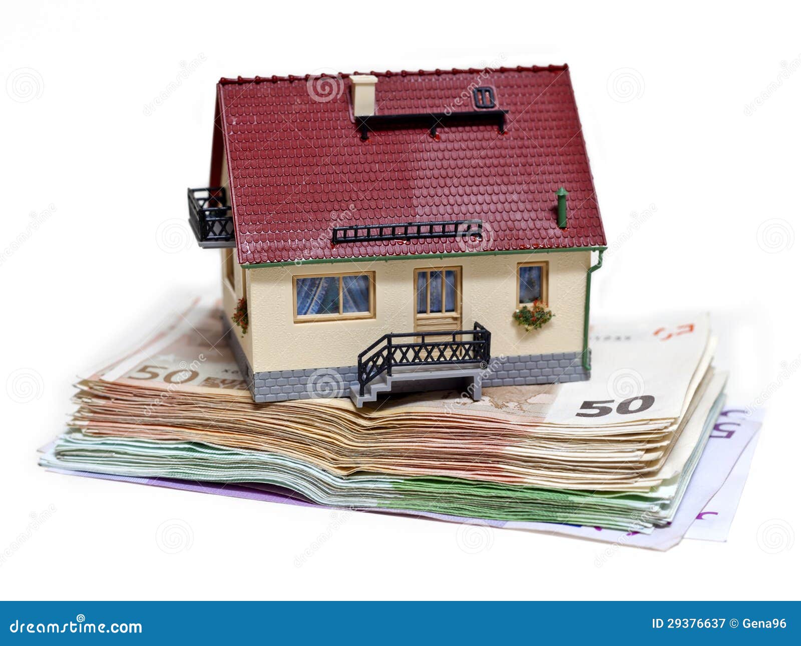 House with Euro banknotes on white background