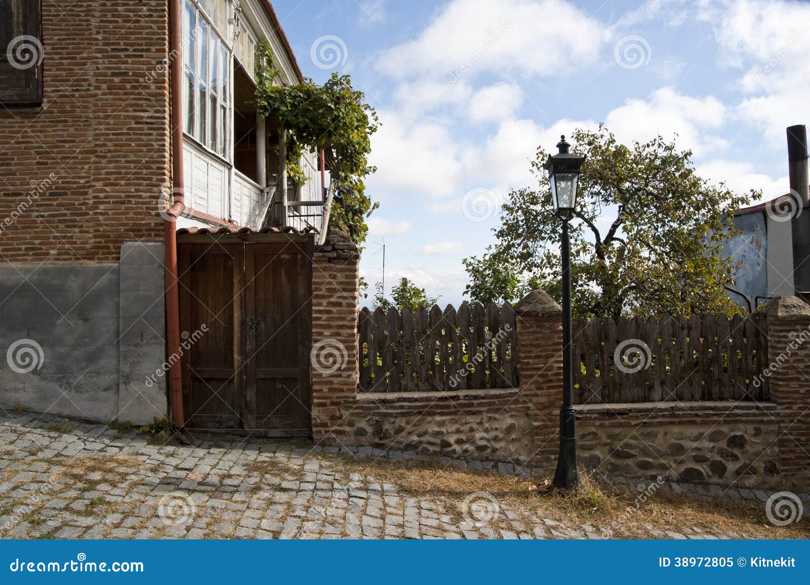 House with fance stock image. Image of gate, cloud, fance - 38972805