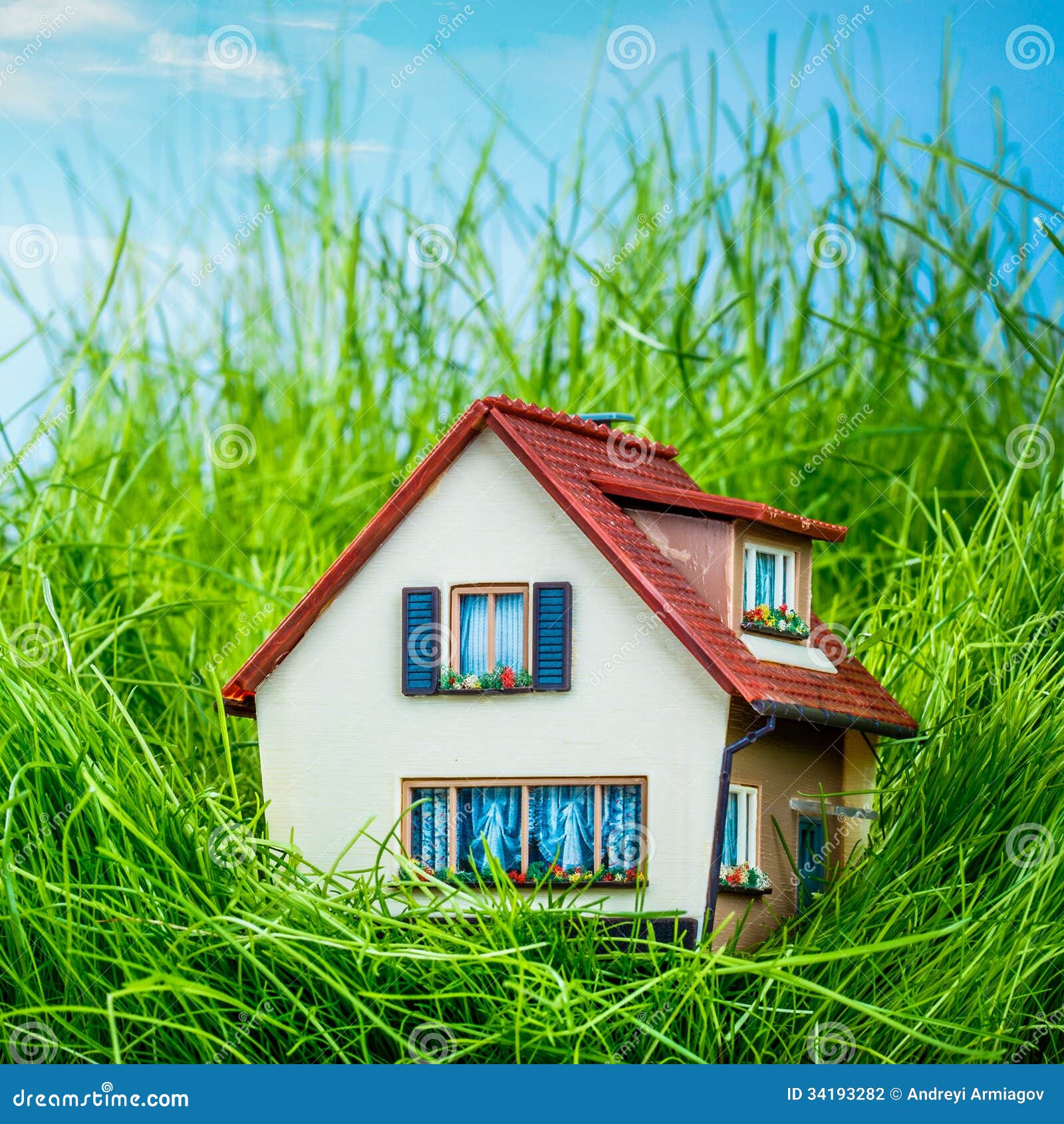House on the green grass stock photo. Image of grass 34193282