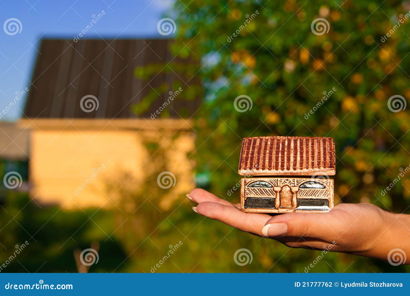 House in hand stock photo. Image of background, business 21777762