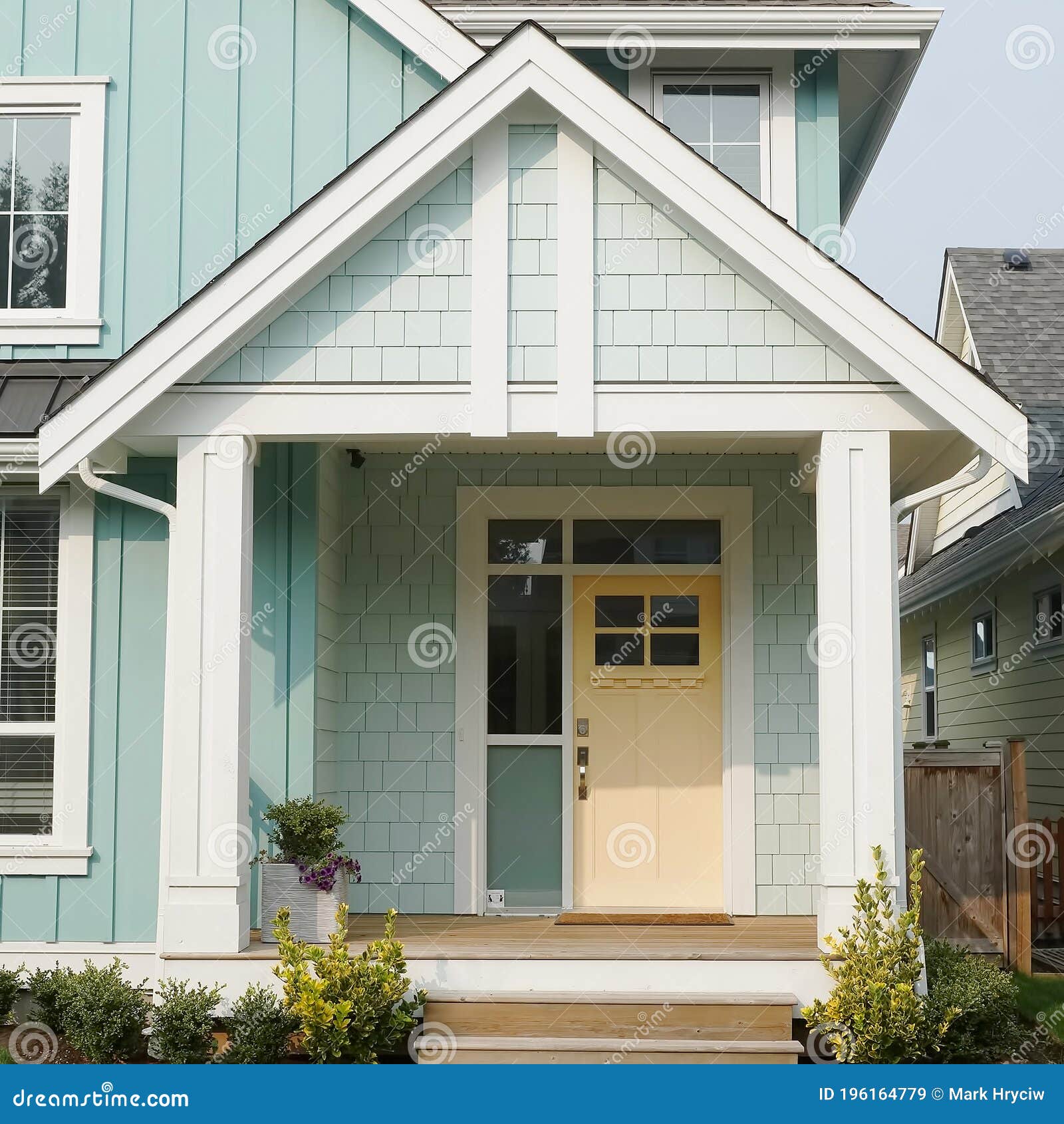 house home pastel yellow door exterior front  elevation roof details