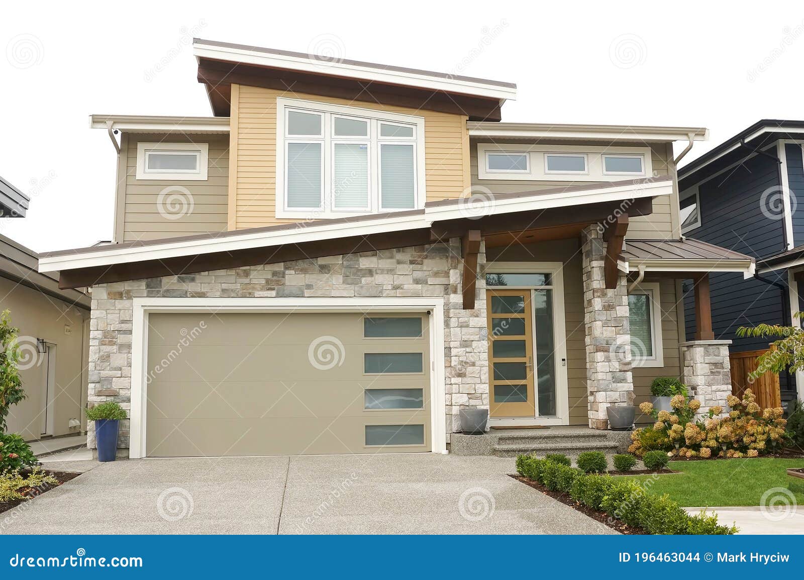 house home tan beige white exterior elevation roof peak details