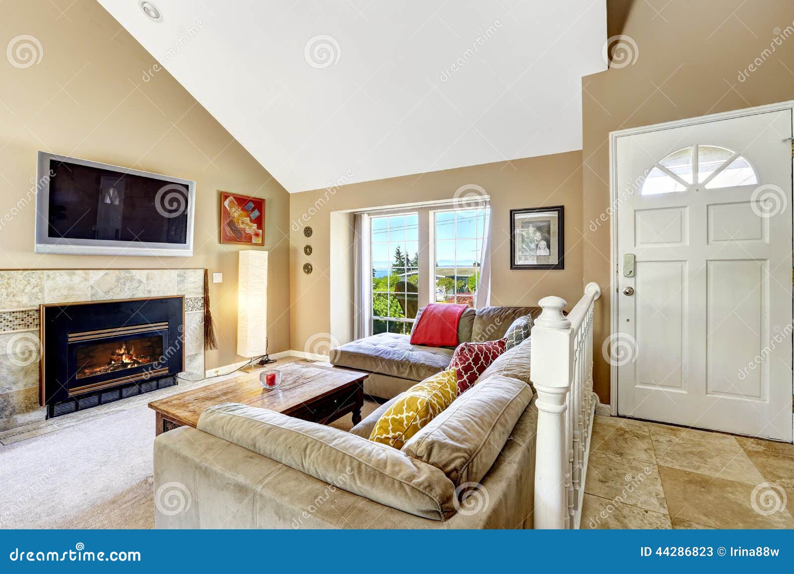 House Interior With High Vaulted Ceiling Living Room With