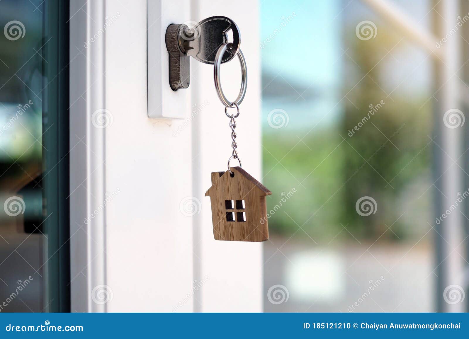 The House Key for Unlocking a New House is Plugged into the Door Stock