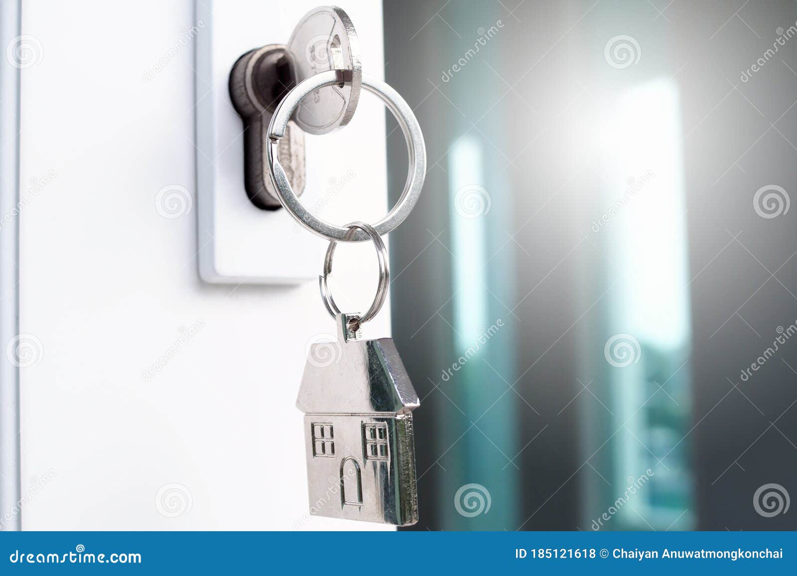 The House Key for Unlocking a New House is Plugged into the Door Stock