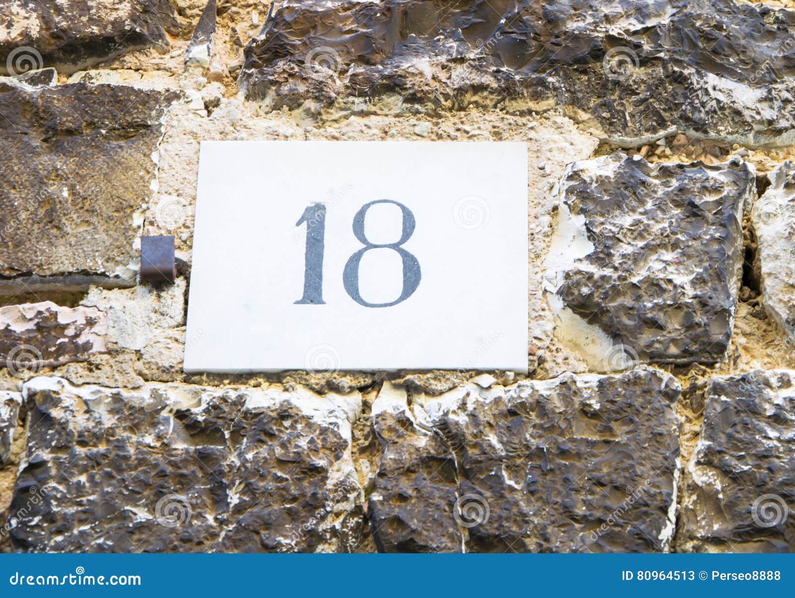 house number 18 sign.