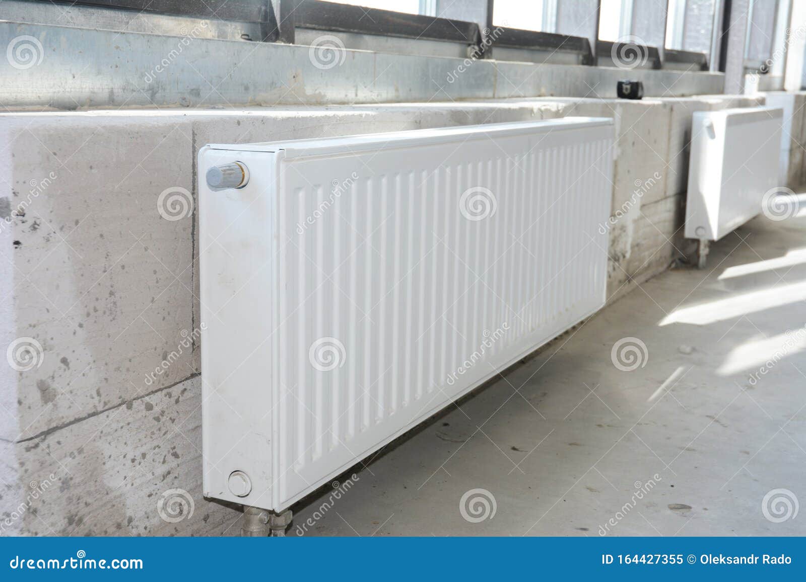 house  radiator heating. installing radiator heating at home.  white metal radiators heating