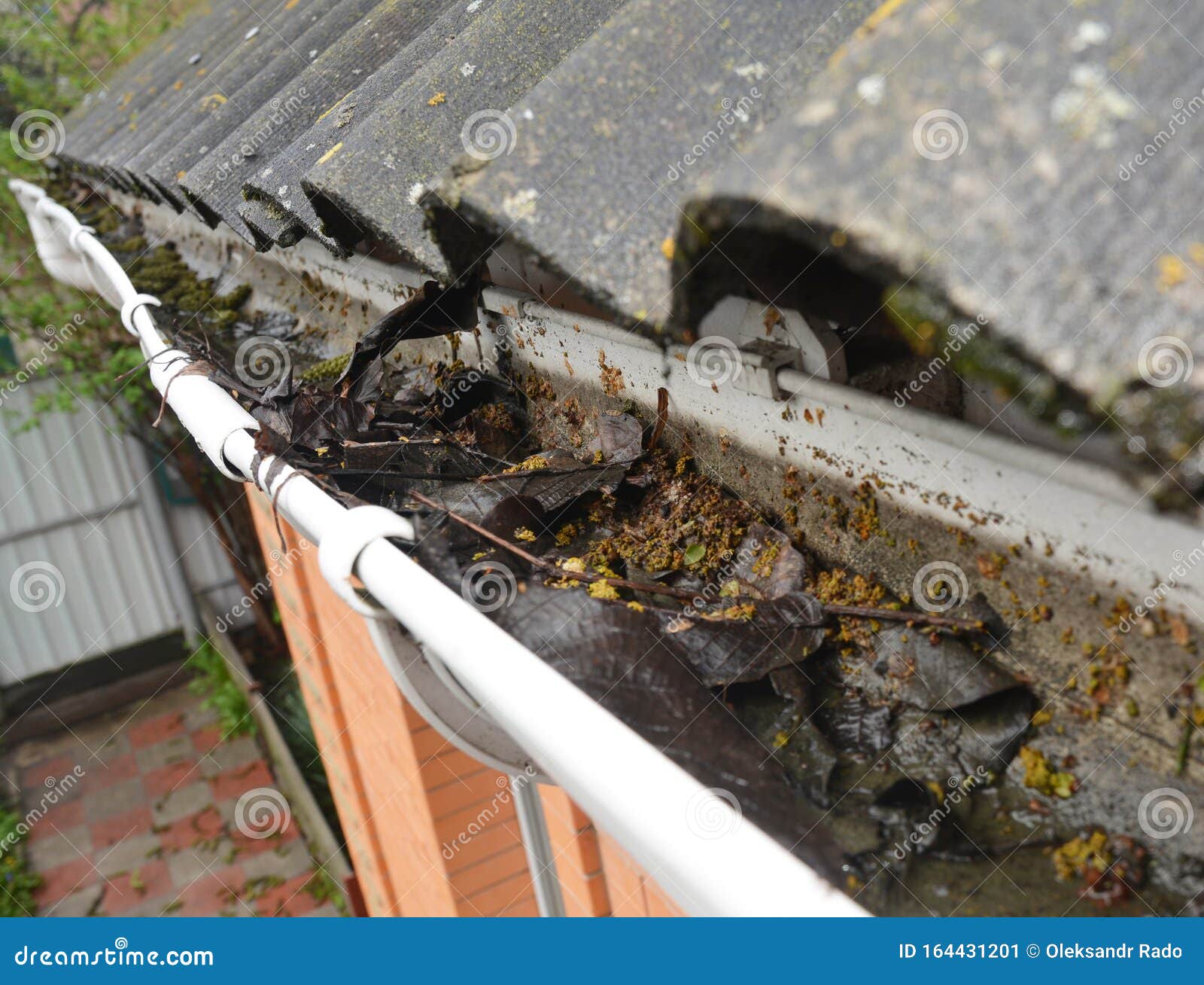 House Roof Gutter Cleaning. Asbestos Roof Gutter Cleaning Stock Image Image of handyman, house