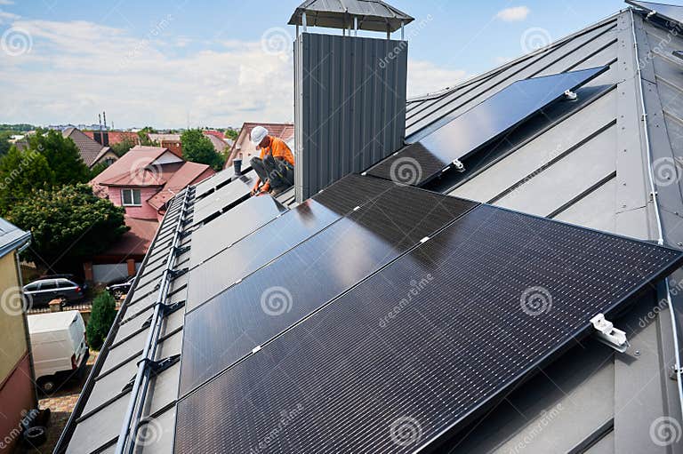 House with Solar Panels on Rooftop for Generating Electricity through ...