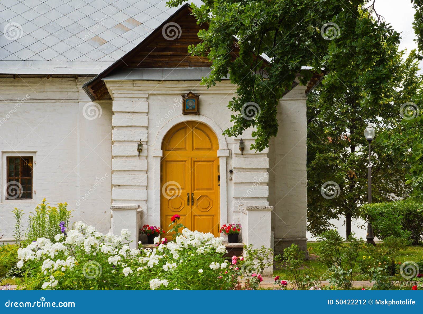 House of White Stone and the Flower Beds Stock Photo Image of leaves