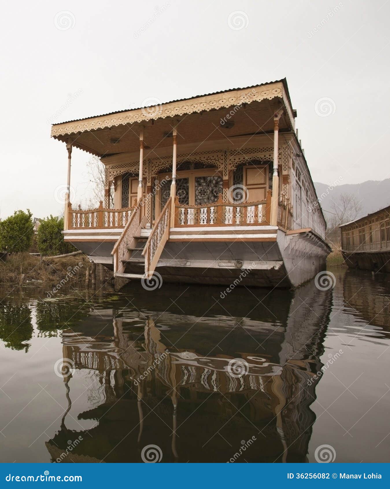 houseboat in a lake, dal lake, srinagar, jammu and kashmir, india