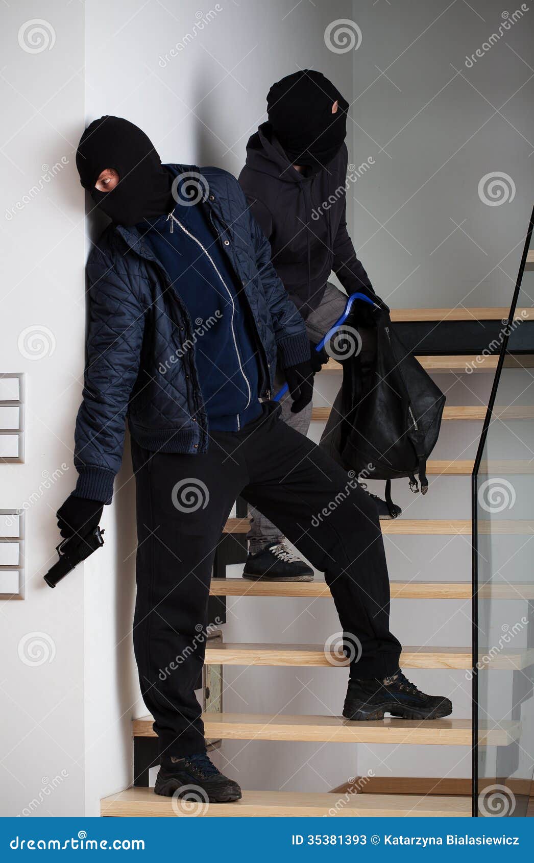 Two burglars escaping stock im picture pic