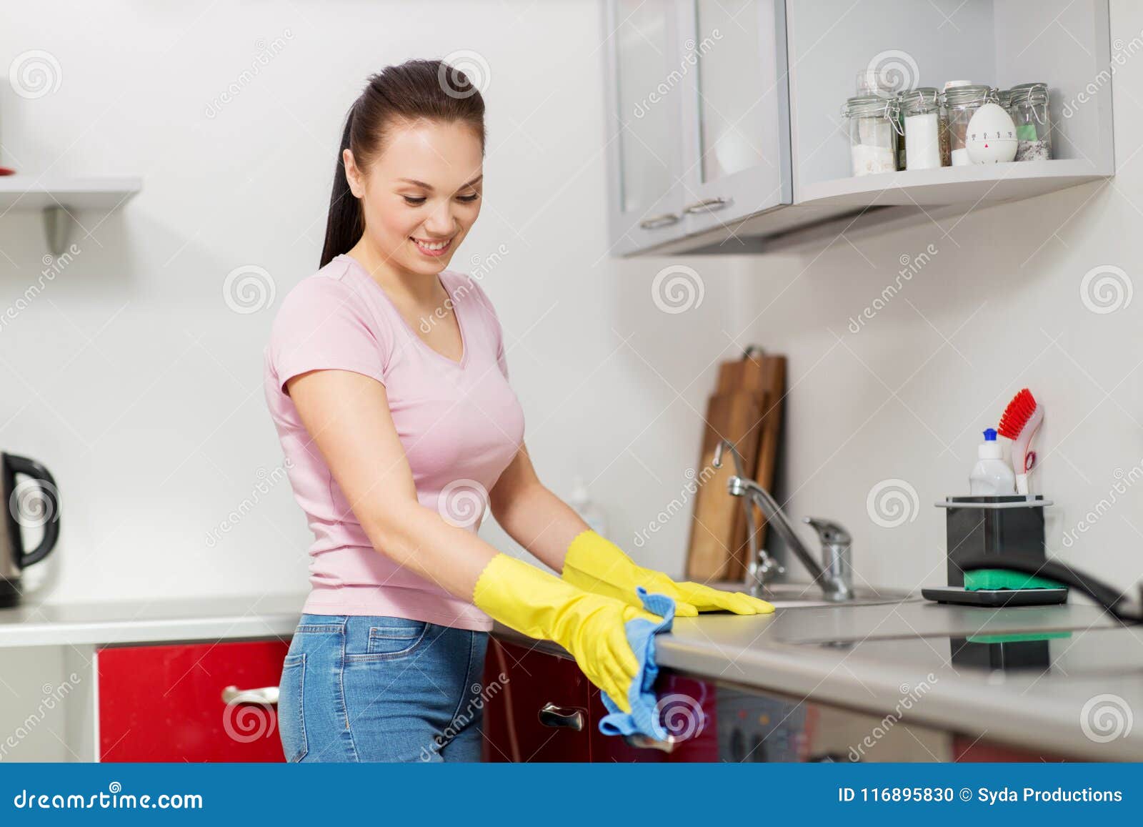 Woman Or Housewife Cleaning Table At Home Kitchen Stock