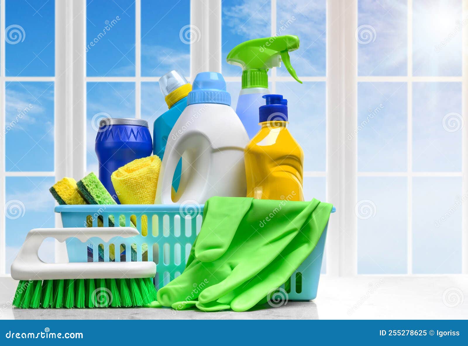 Basket with cleaning products on white background. Cleaning with