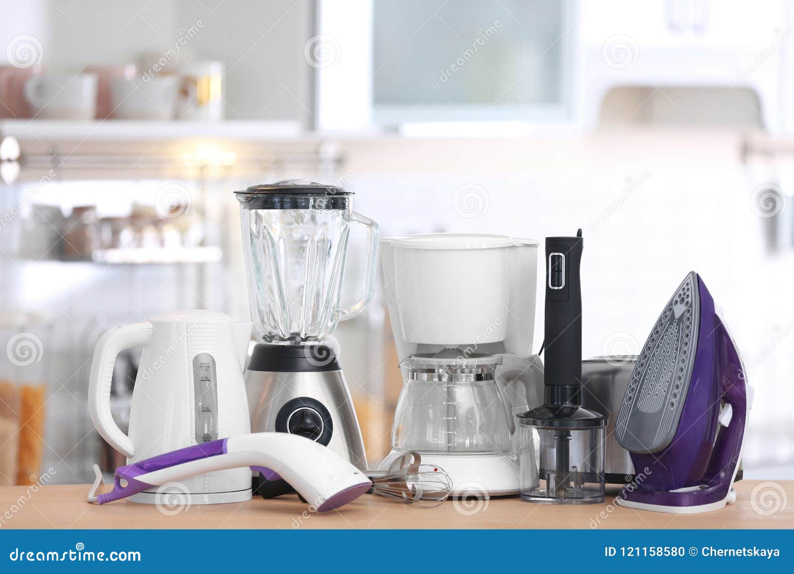 Household and Kitchen Appliances on Table Indoors Stock Photo Image