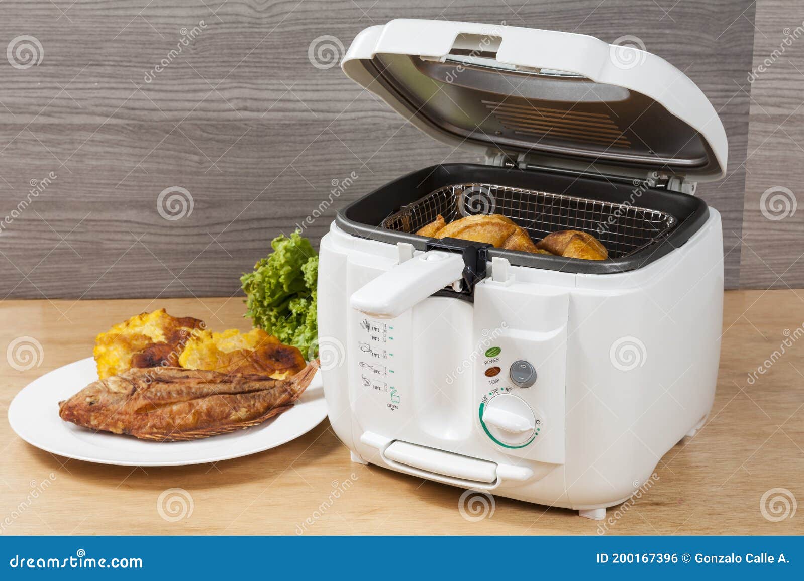 Household Kitchen a White Automatic Electric Fryer Pot Stock Photo