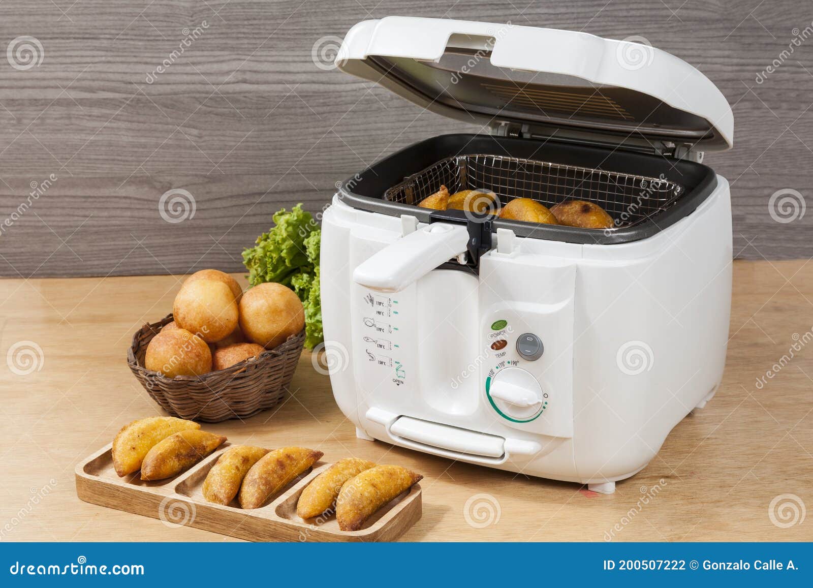 Household Kitchen a White Automatic Electric Fryer Pot Stock Photo
