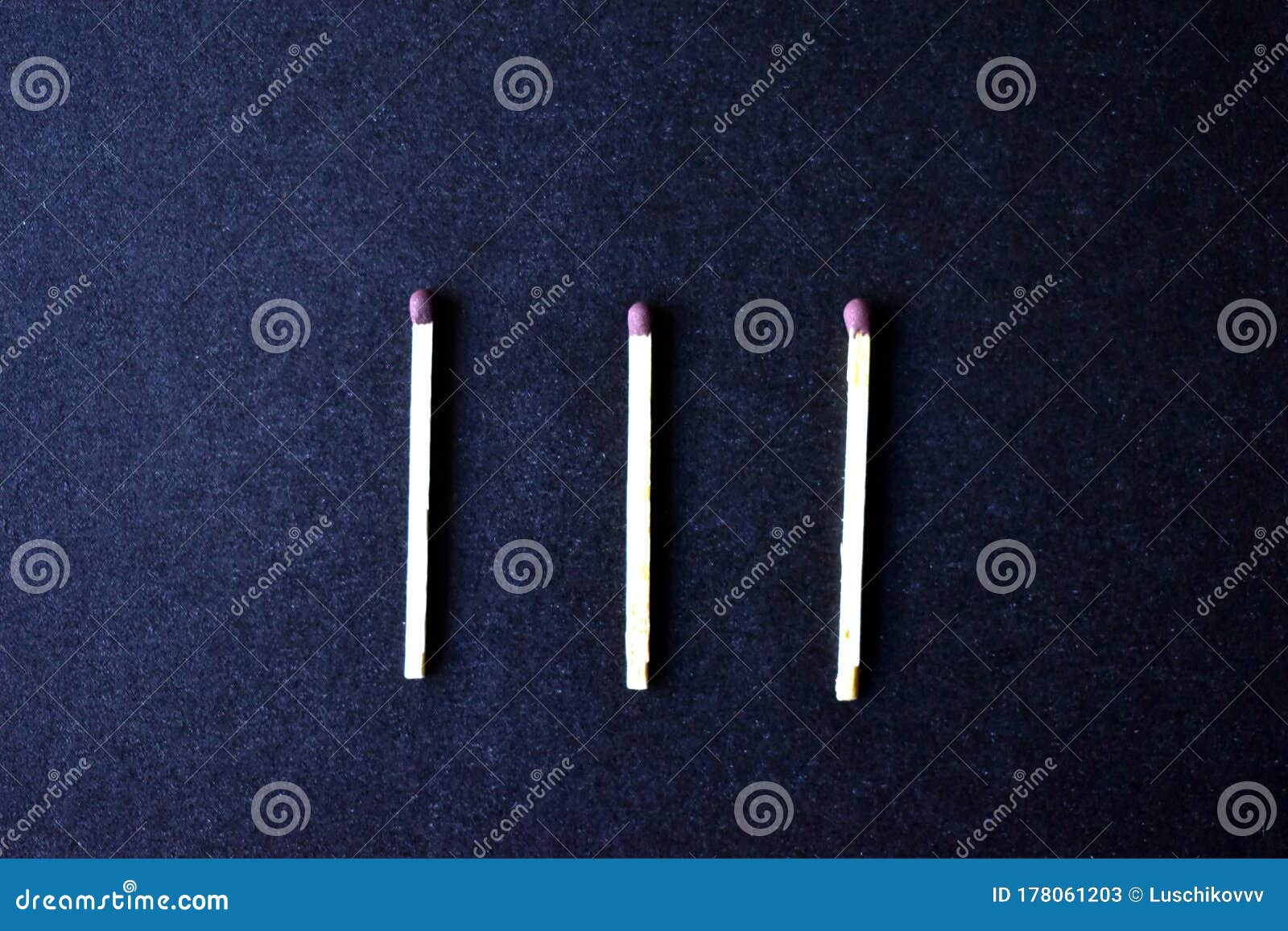 household matches and boxes for lighting on a blue background