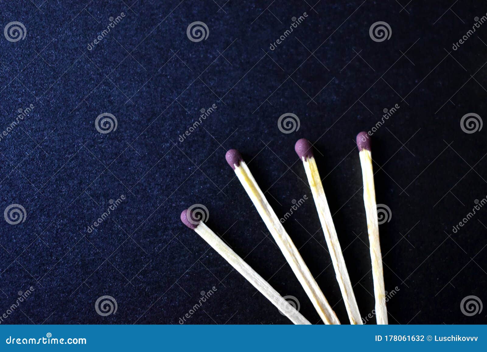 household matches and boxes for lighting on a blue background
