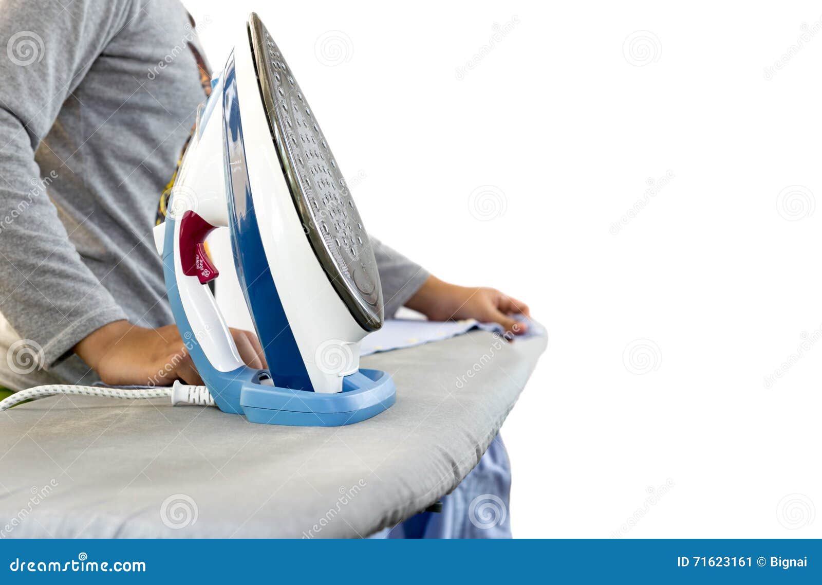 Housekeeper Ironing Clothes On Ironing Board In Isolated Stock Image