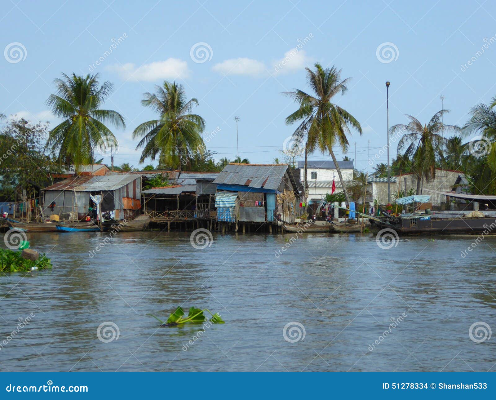 Houses In Cai Be Vietnam Along The Mekong River Delta