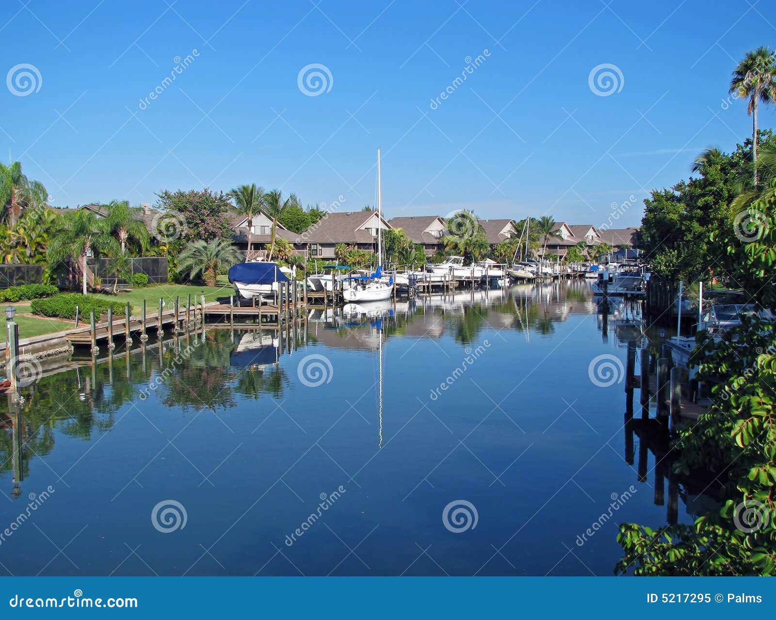 Houses beside canal stock image. Image of mooring, beautiful 5217295