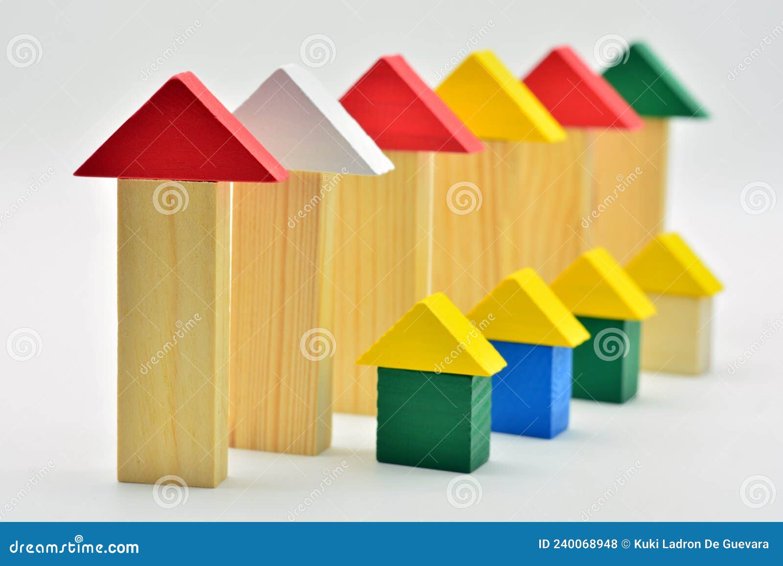 houses made with wooden blocks in a row