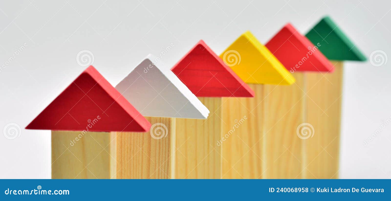 houses made with wooden blocks in a row