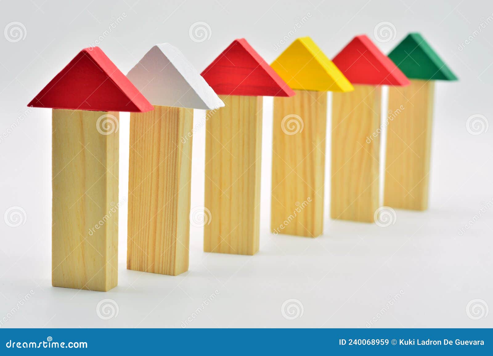 houses made with wooden blocks in a row