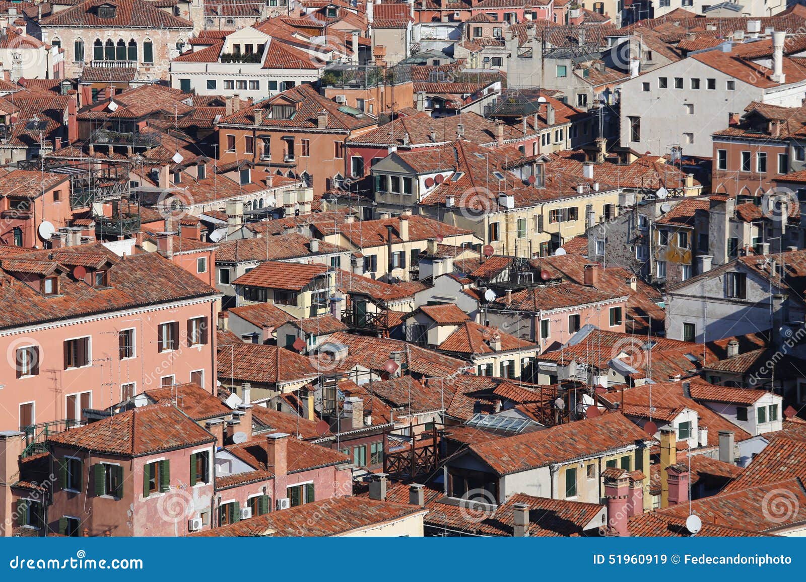 houses with red-tile roofs and bricks in southern europe
