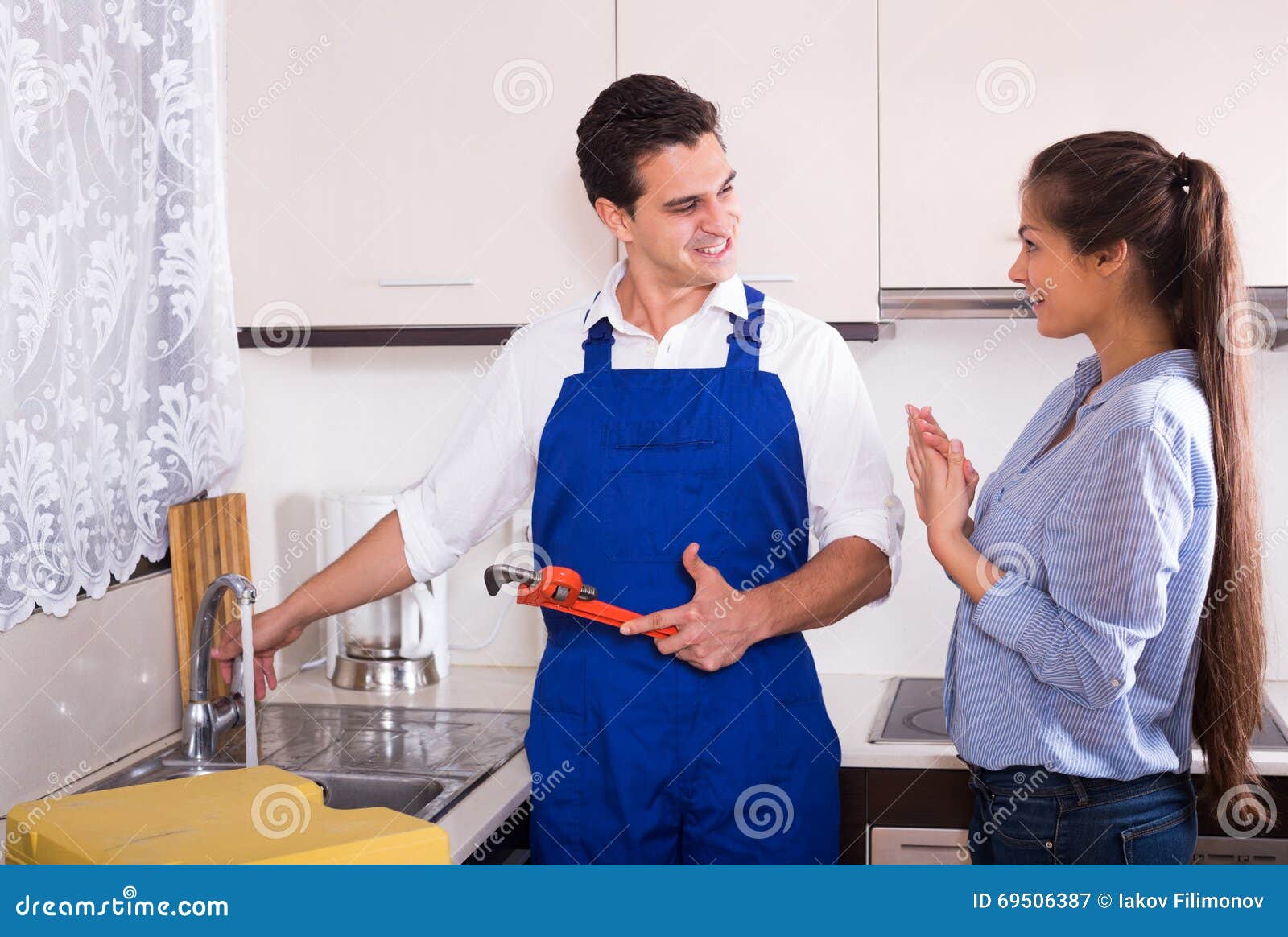 Housewife Called Professional Plumber with Tools To Change Bib picture