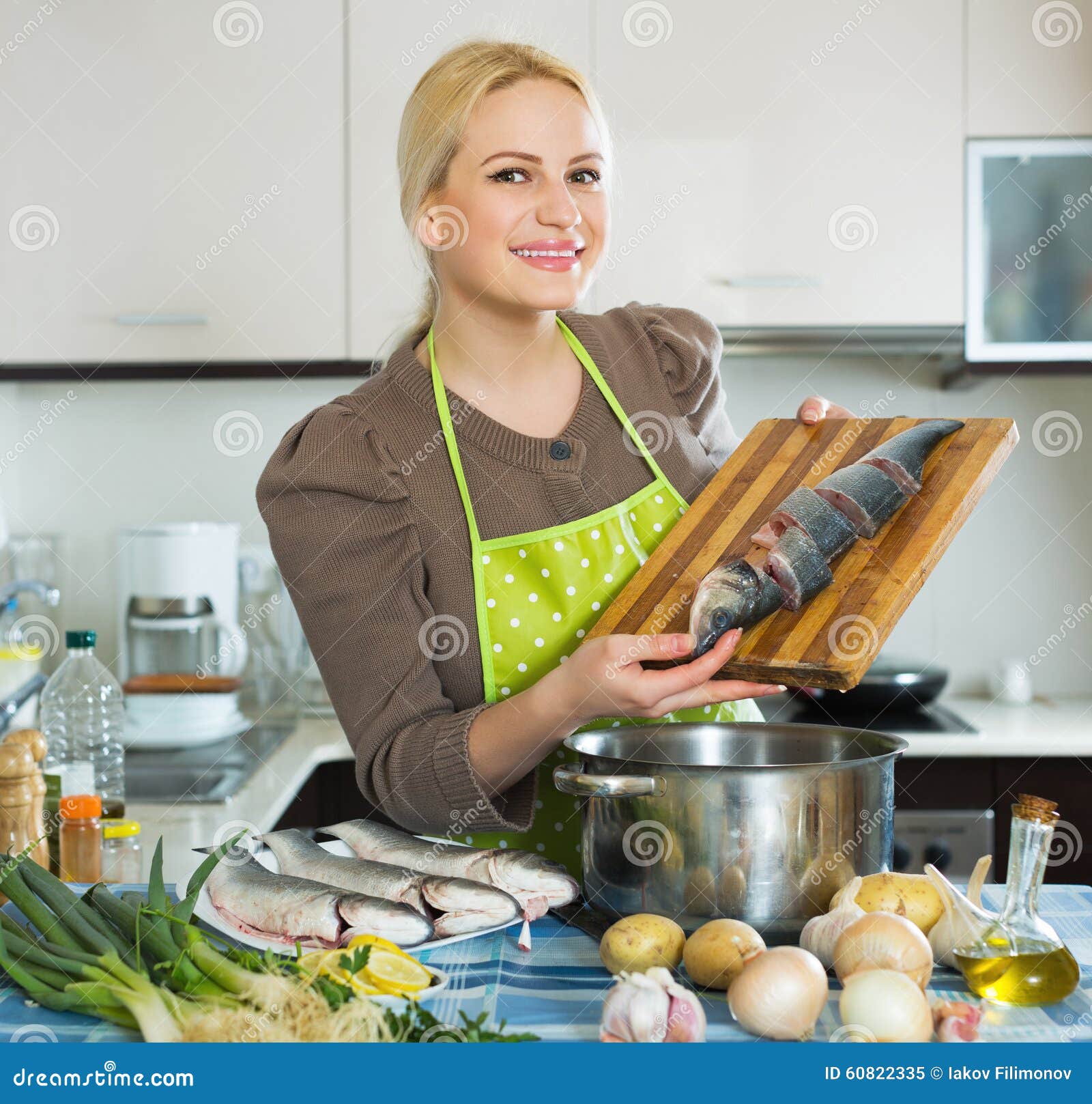 Housewife Cooking Soup With Fish Stock Image Im