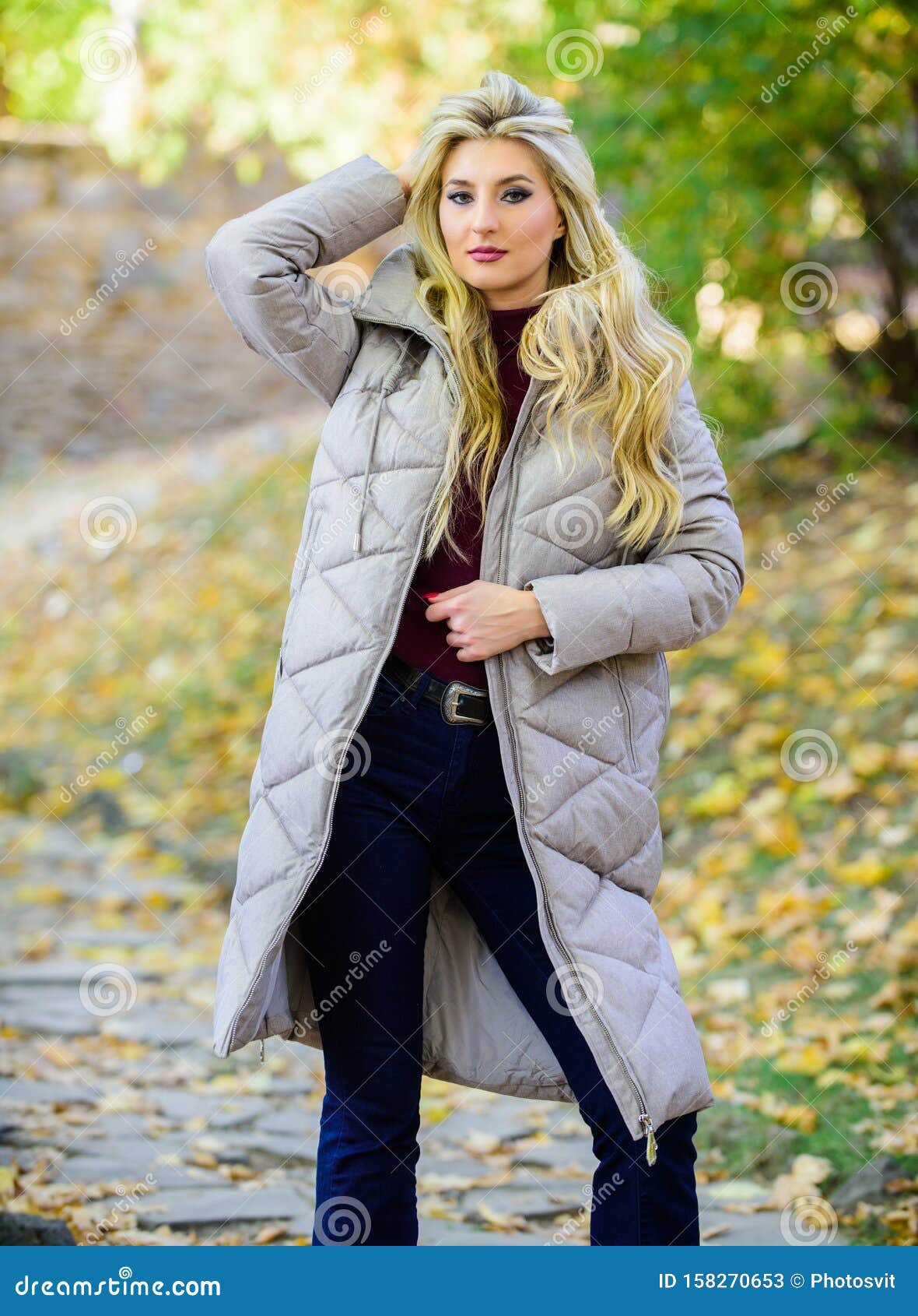 How To Rock Puffer Jacket Like Star. Puffer Fashion Trend Concept. Girl  Fashionable Blonde Walk in Autumn Park Stock Image - Image of attractive,  coat: 158270653