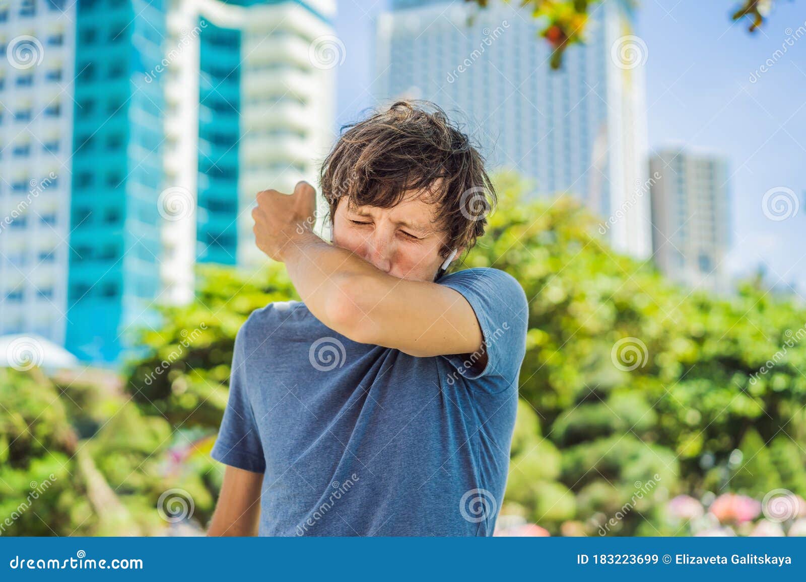 how-to-sneeze-correctly-man-sneezes-on-the-elbow-stock-image-image